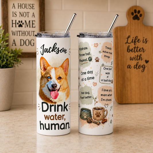Personalized dog mom tumbler with a corgi's photo and name shown front and back on a kitchen counter.