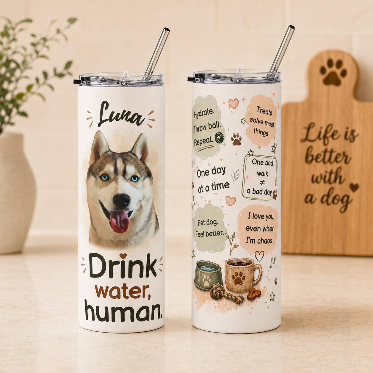 Husky dog mom tumbler on a counter near a wooden 'life is better with a dog' sign.