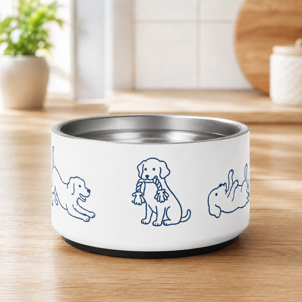 Non-slip stainless steel dog bowl filled with kibble on a wood counter